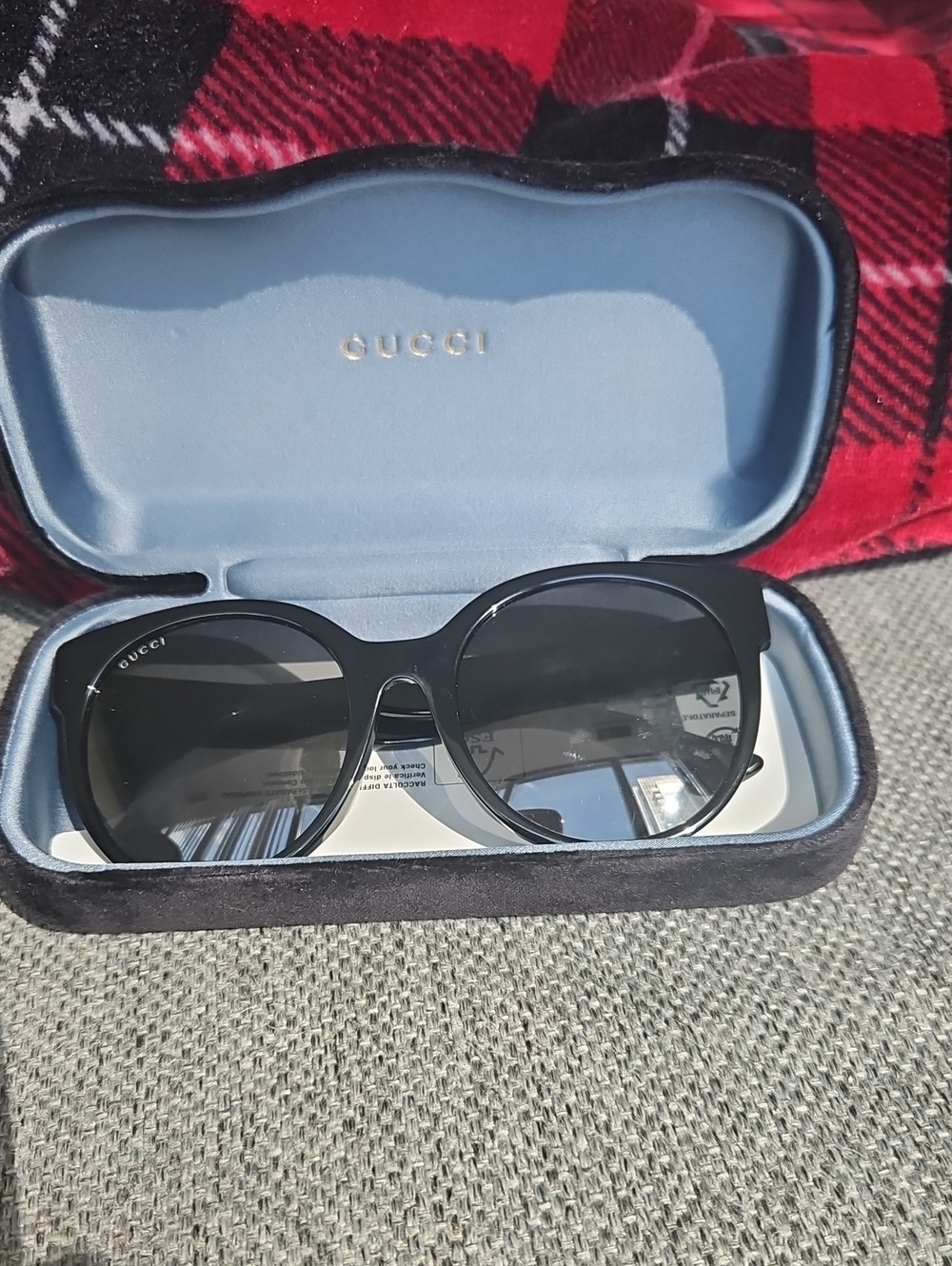 Gucci Women’s Black Frame Sunglasses with Dark Lenses